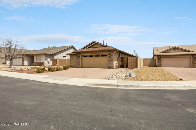 a view of a street in front of house