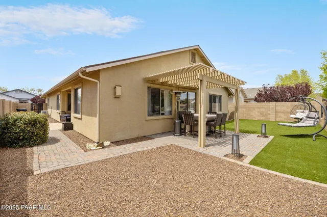 a view of swimming pool with outdoor seating