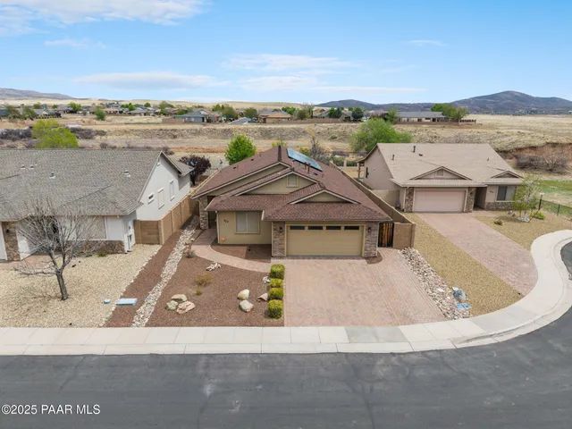 a view of a swimming pool with an ocean view