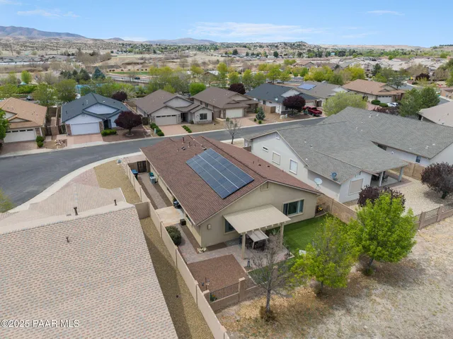 an aerial view of a house with a outdoor space