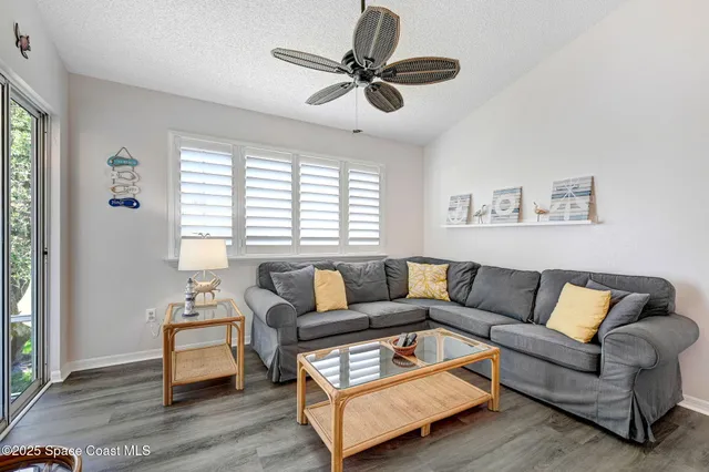 a view of swimming pool with a yard