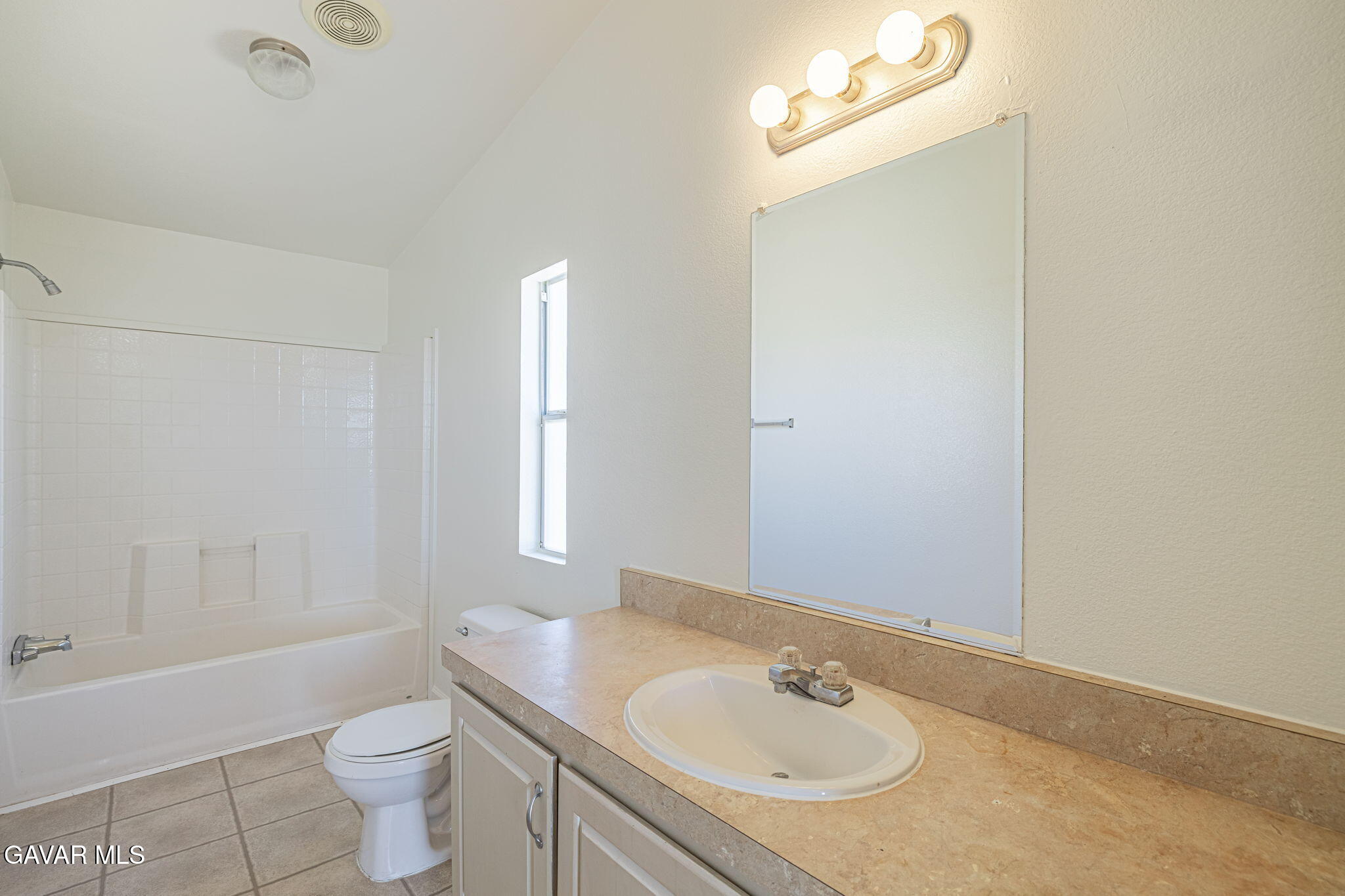 26321 Olanche Street Mojave, CA 93501 - Photo 19 of 40 a bathroom with a granite countertop sink toilet and shower