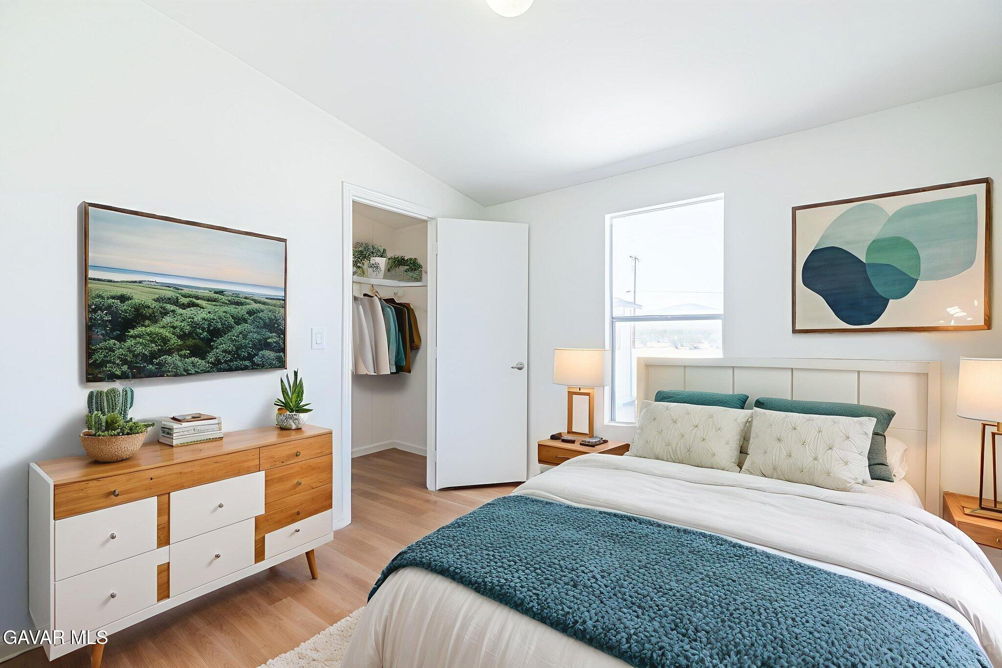 26321 Olanche Street Mojave, CA 93501 - Photo 22 of 40 a bedroom with a bed and a dresser