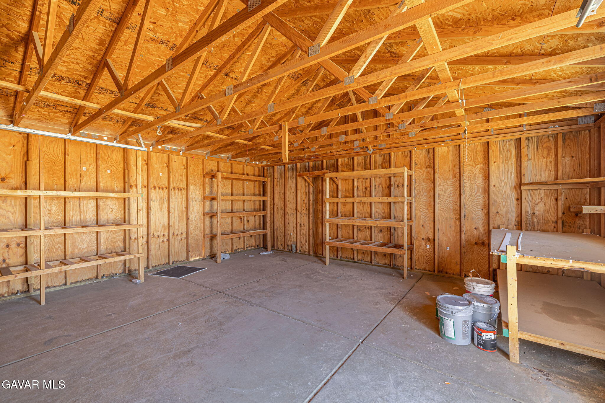 26321 Olanche Street Mojave, CA 93501 - Photo 35 of 40 a view of a room with lots of wooden cabinets