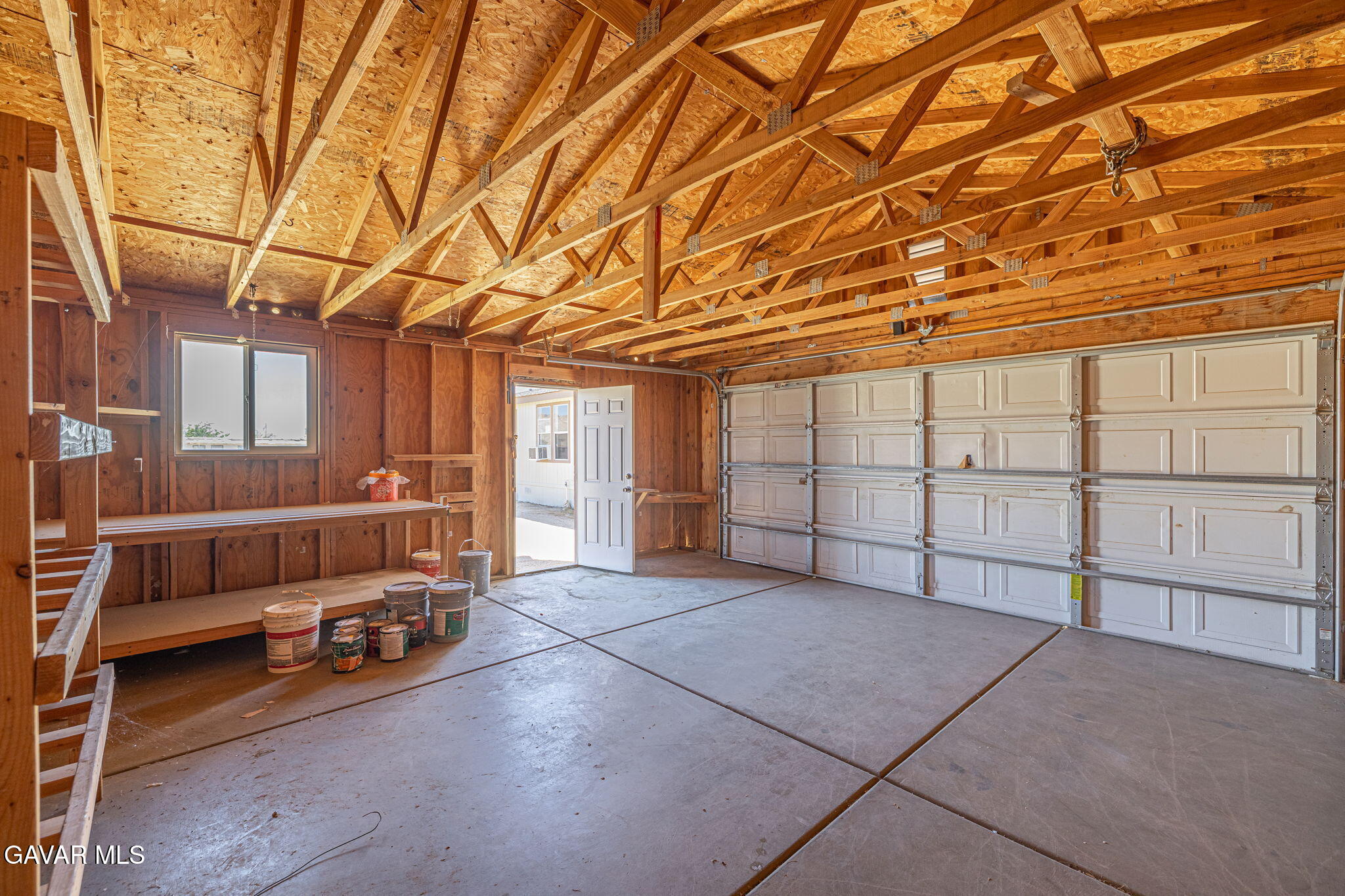 26321 Olanche Street Mojave, CA 93501 - Photo 36 of 40 a view of a room with racks on the wall