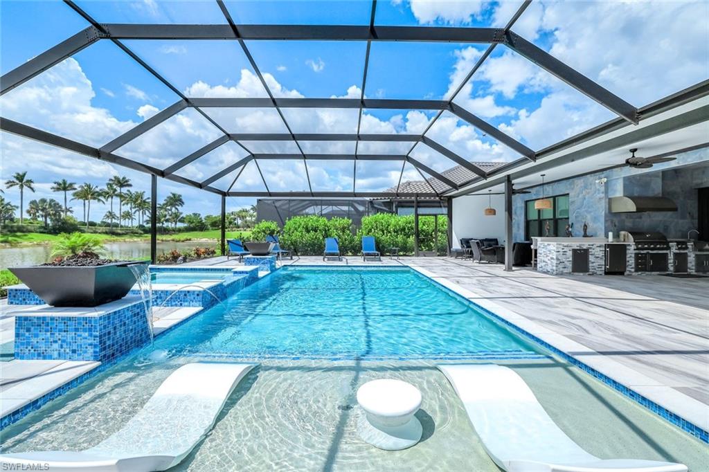 a view of a swimming pool with a patio