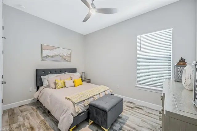 a bathroom with a shower and a glass door