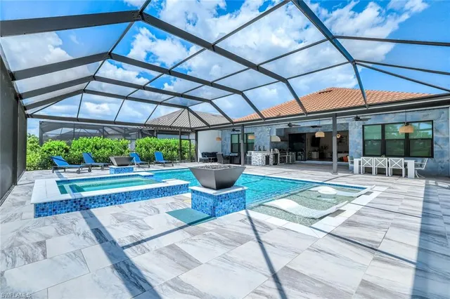 a dining room with furniture and a table