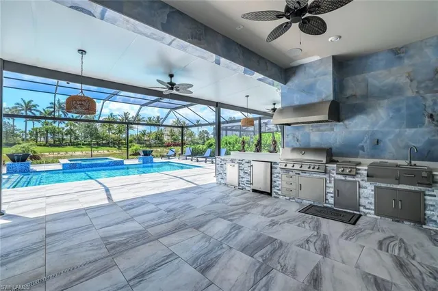 a view of a backyard with seating space