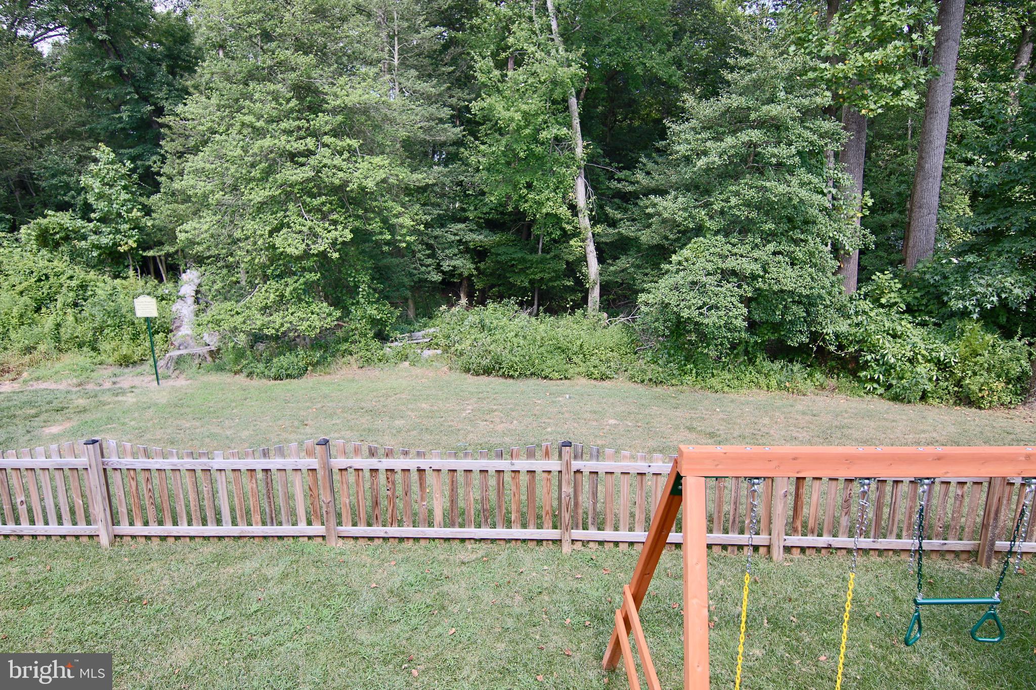 635 Old Waugh Chapel Road Odenton, MD 21113 - Photo 47 of 52 Fence backyard back to treed common area