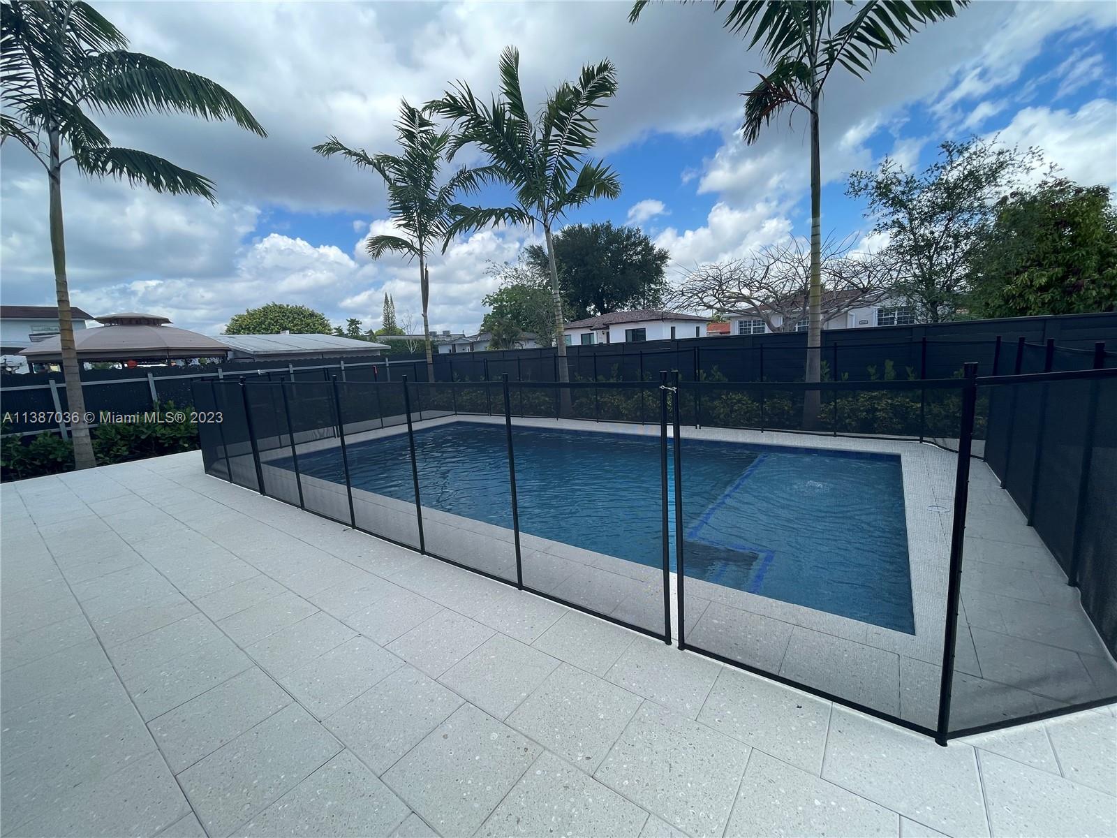 6535 Southwest 26th Street Miami, FL 33155 - Photo 18 of 19 a view of a backyard