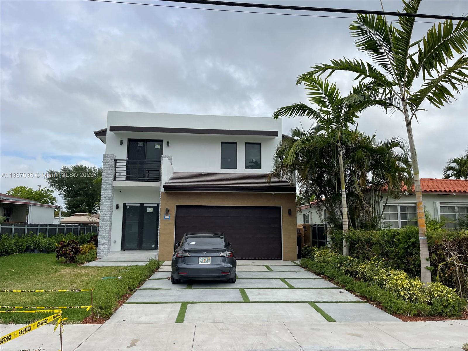6535 Southwest 26th Street Miami, FL 33155 - Photo 8 of 19 a house view with a garden space