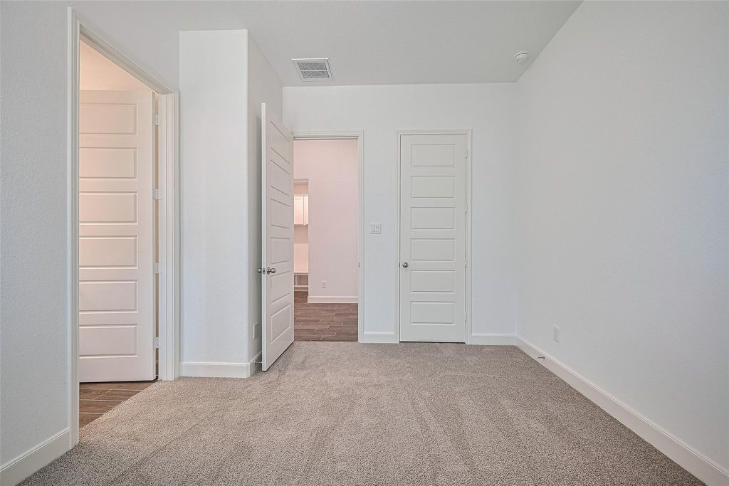 1051 Comal Trail Dayton, TX 77535 - Photo 23 of 49 a view of an empty room