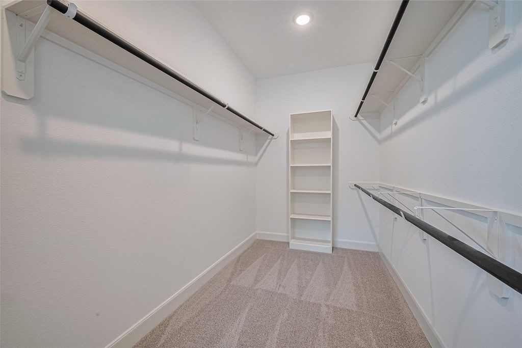 1051 Comal Trail Dayton, TX 77535 - Photo 46 of 49 a view of an empty walk in closet