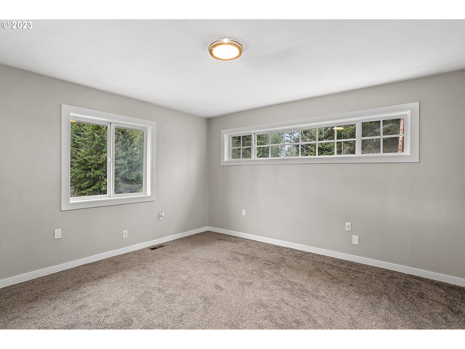 189 Acme Road White Salmon, WA 98672 - Photo 30 of 48 a view of an empty room with a window