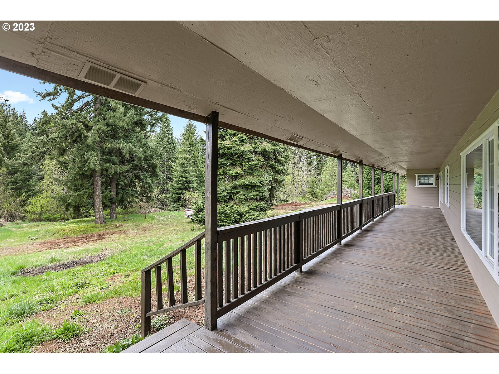 189 Acme Road White Salmon, WA 98672 - Photo 36 of 48 a view of a wooden deck next to a yard