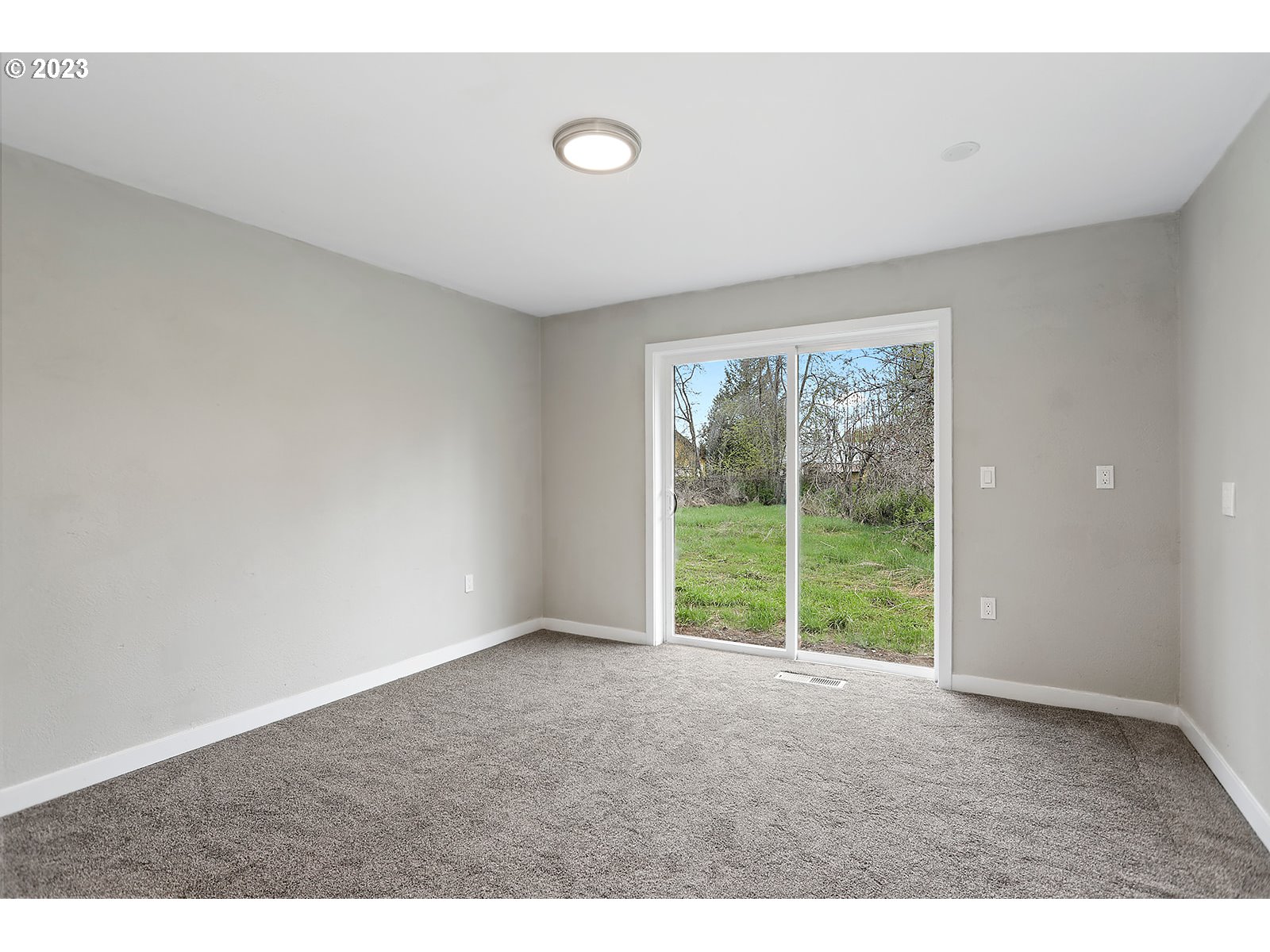 189 Acme Road White Salmon, WA 98672 - Photo 9 of 48 a view of an empty room with a window