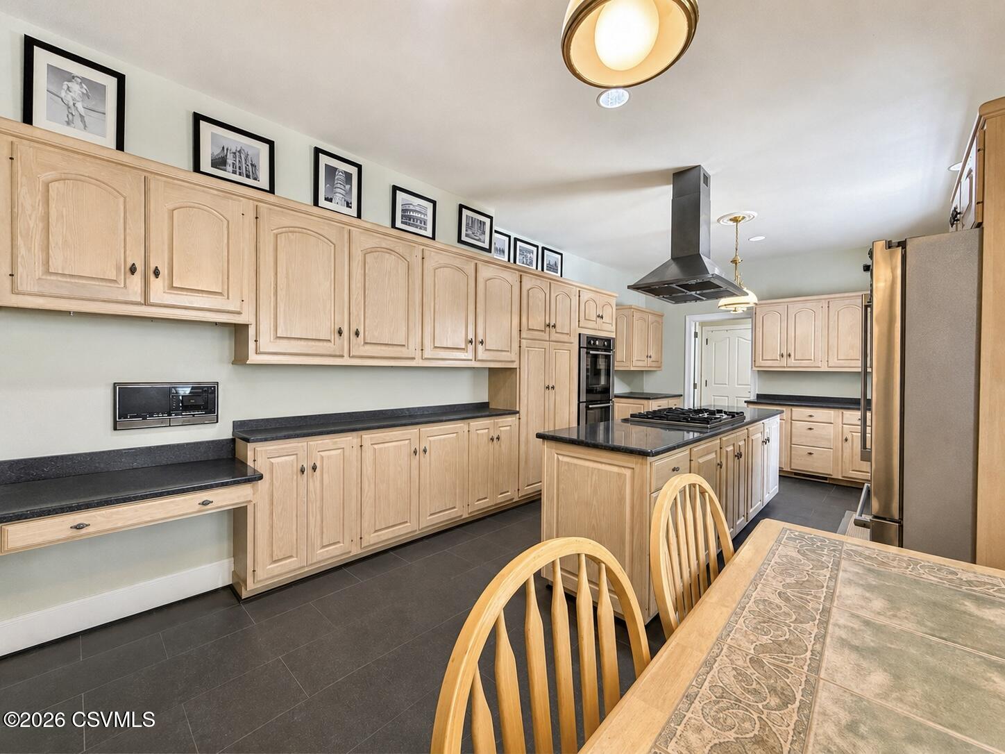 50 Sweet Gum Road Selinsgrove, PA 17870 - Photo 32 of 82 a kitchen with stainless steel appliances granite countertop a sink dishwasher a stove and a refrigerator with wooden floor