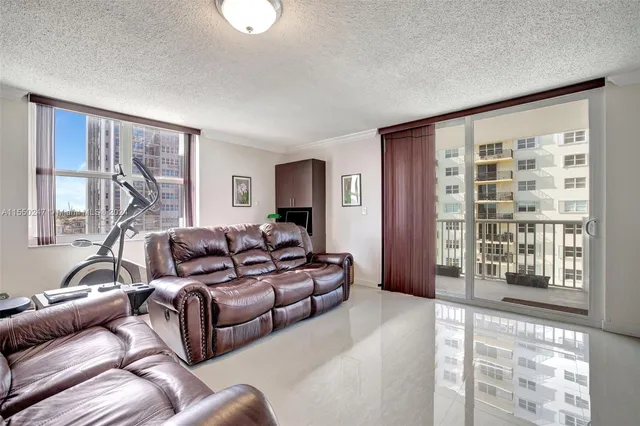 a front view of a house with garden and porch