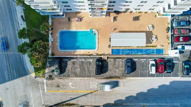 a view of a balcony with wooden floor