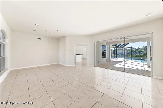 a view of an empty room and window