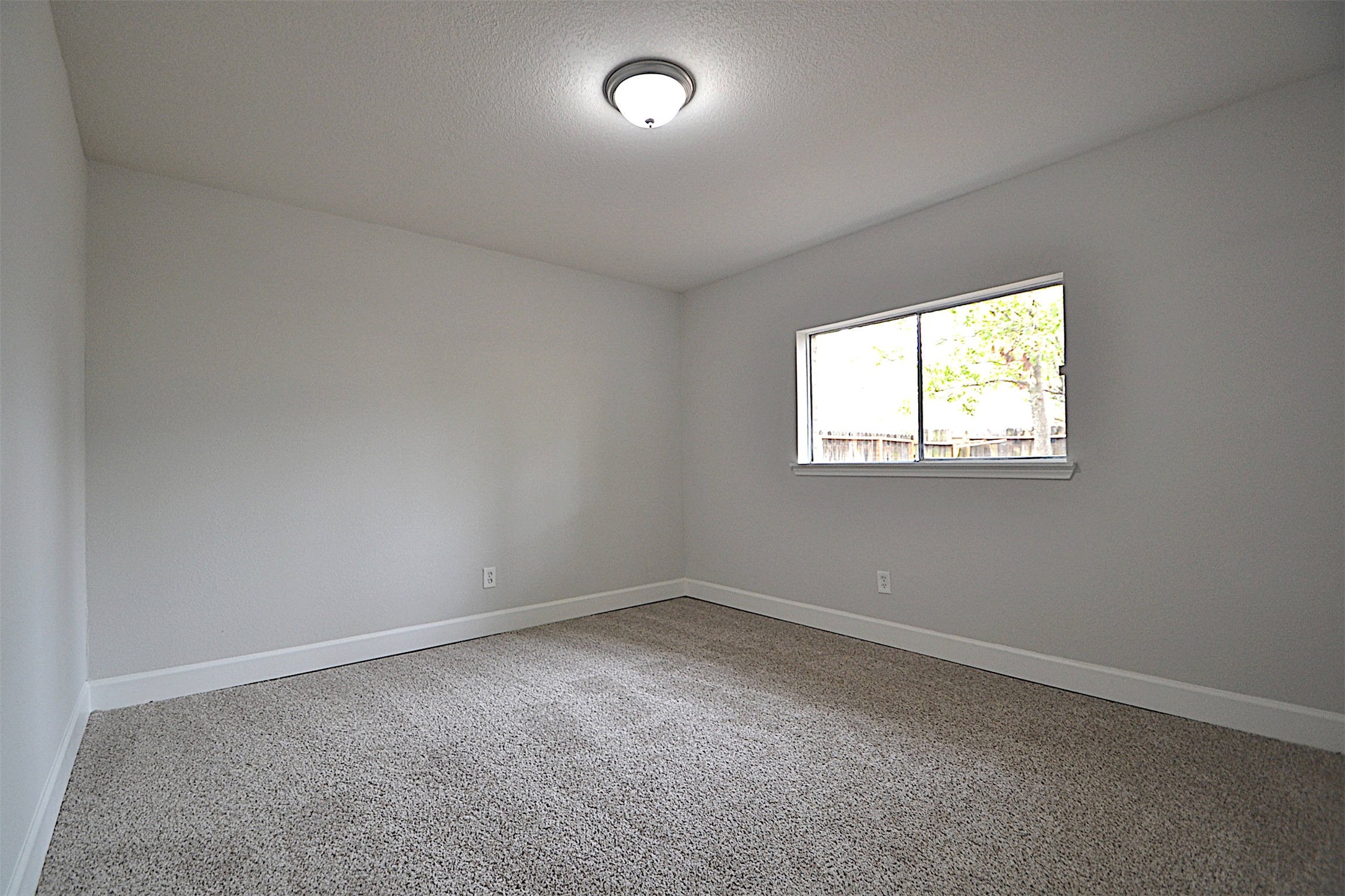 4527 Adonis Drive Spring, TX 77373 - Photo 20 of 32 an empty room with a window