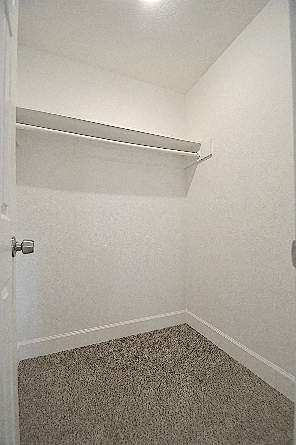4527 Adonis Drive Spring, TX 77373 - Photo 27 of 32 a view of a room with racks on the wall