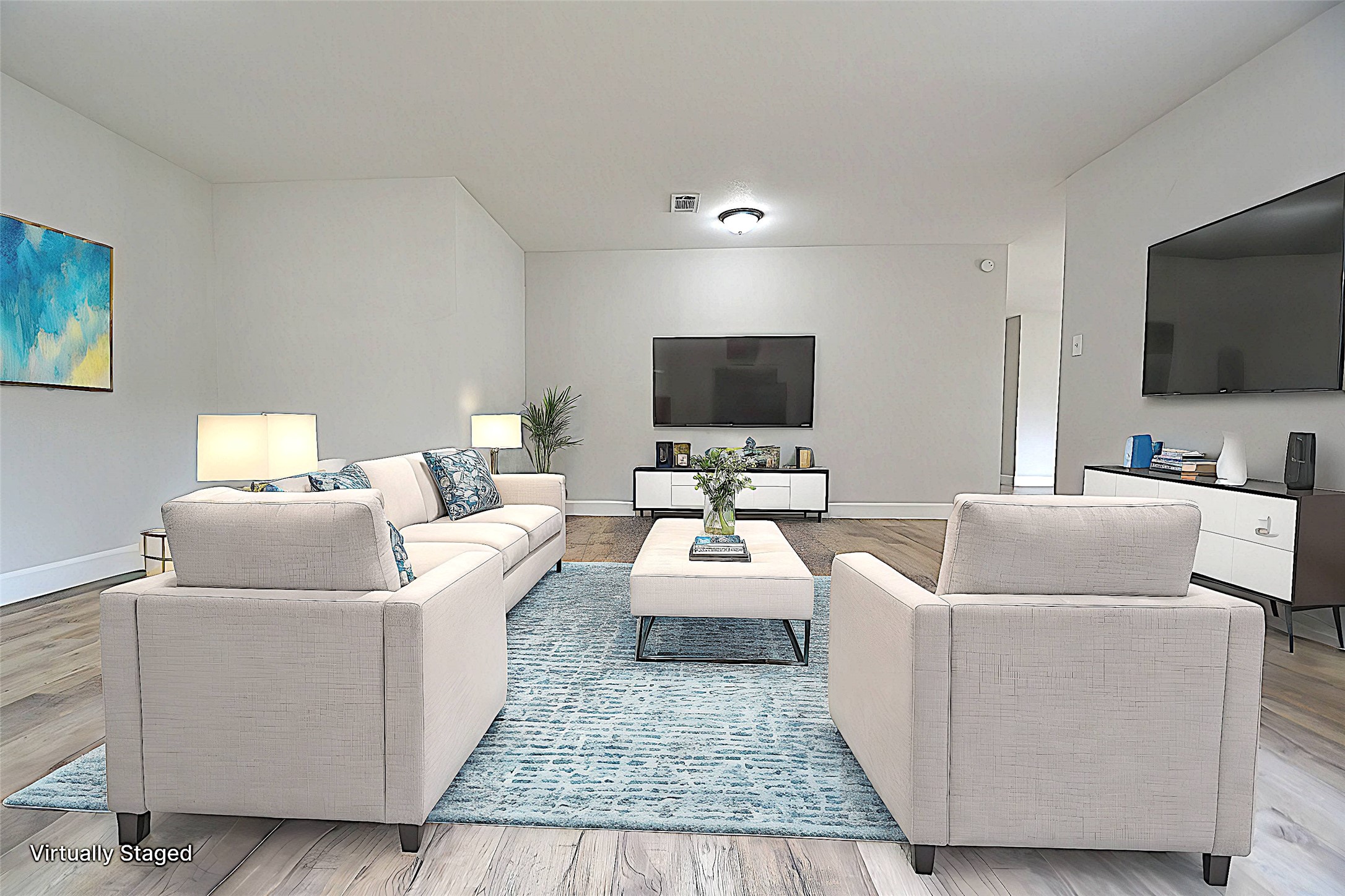 4527 Adonis Drive Spring, TX 77373 - Photo 6 of 32 a living room with furniture and a flat screen tv