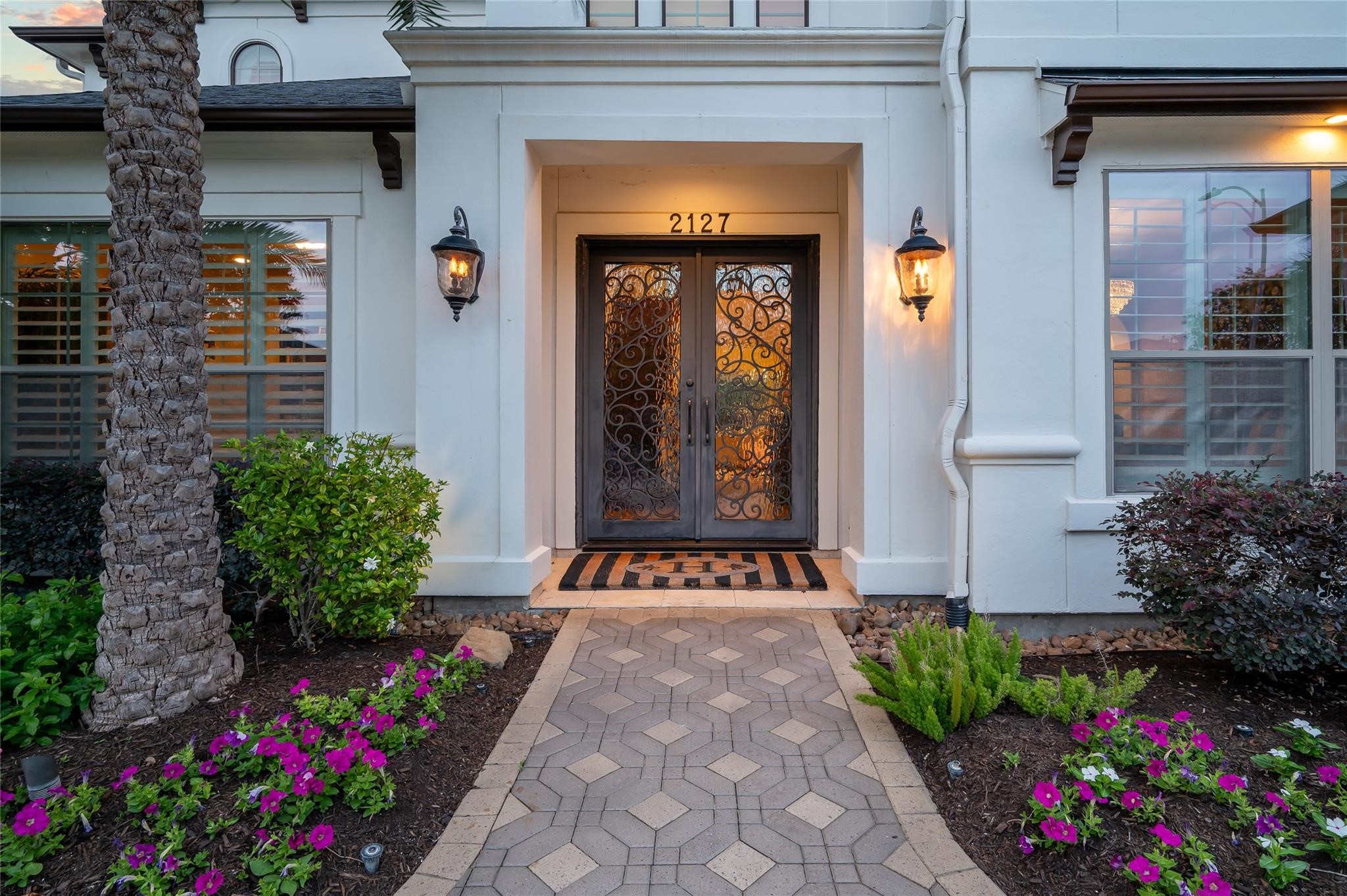 2127 Thicket Ridge Lane Houston, TX 77077 - Photo 5 of 50 Enter this welcoming home through double custom wrought iron front doors that were designed specifically for this residence.
