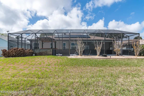 a house view with a garden space