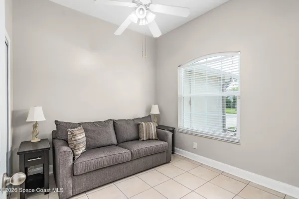 a view of livingroom with hardwood floor and a ceiling fan