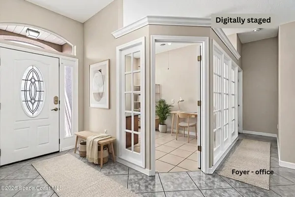 a kitchen with stainless steel appliances granite countertop a sink refrigerator stove and microwave