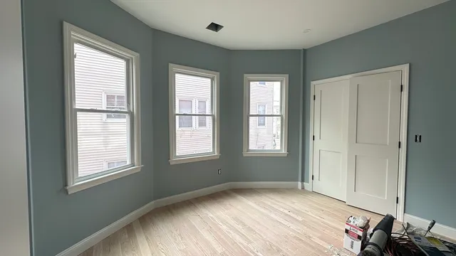 an empty room with windows