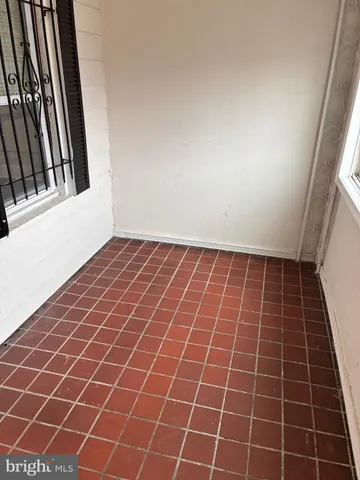 a view of an empty room with a sink