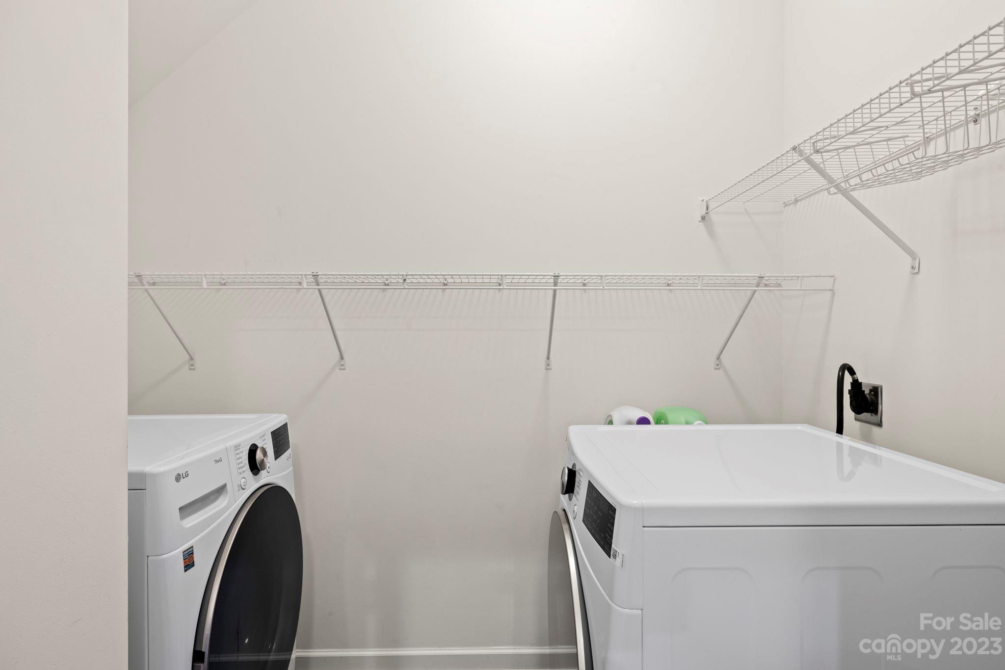59 North River Road Fletcher, NC 28732 - Photo 17 of 36 a utility room with dryer and washer