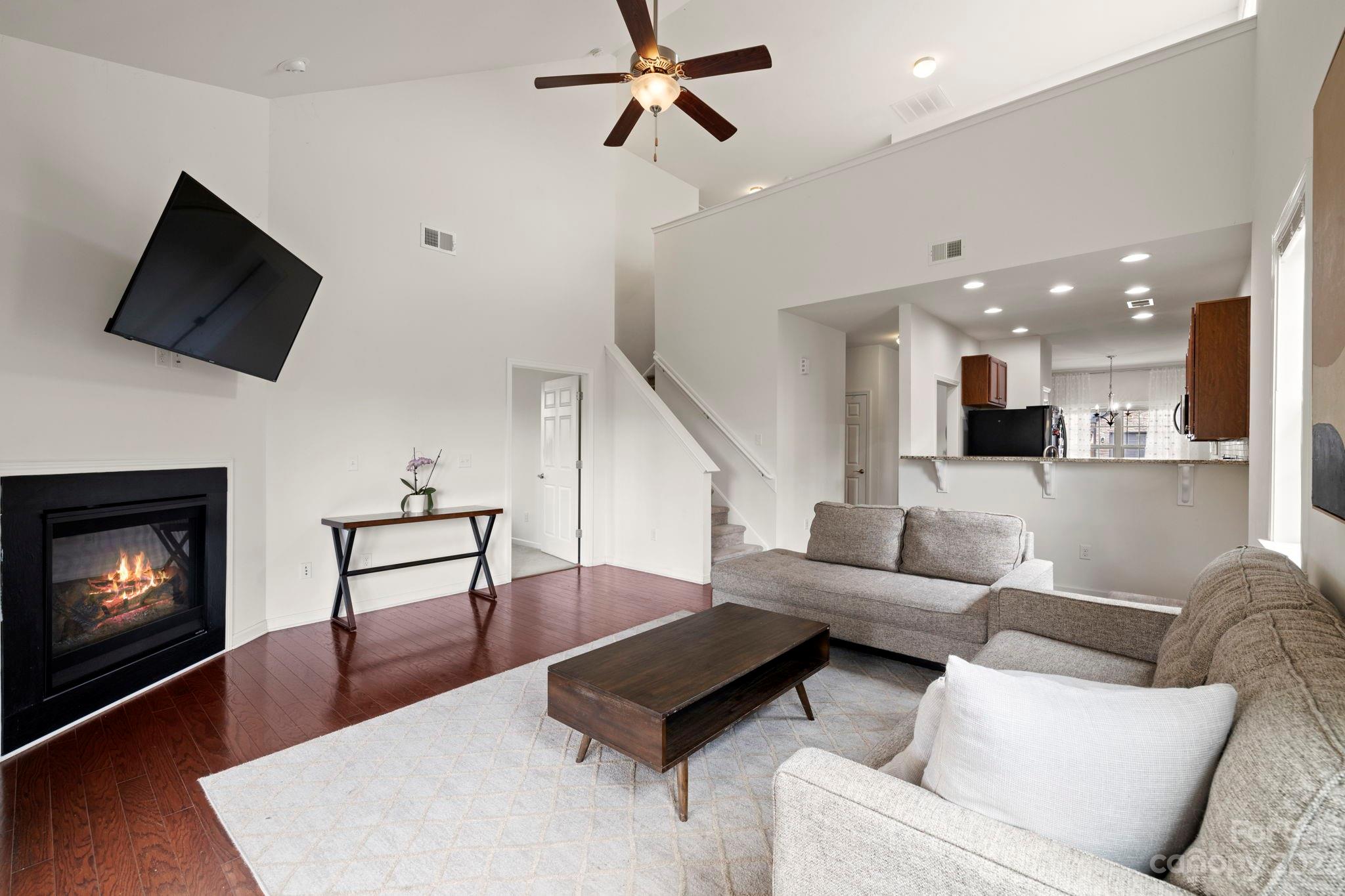 59 North River Road Fletcher, NC 28732 - Photo 6 of 36 a living room with furniture and a fireplace