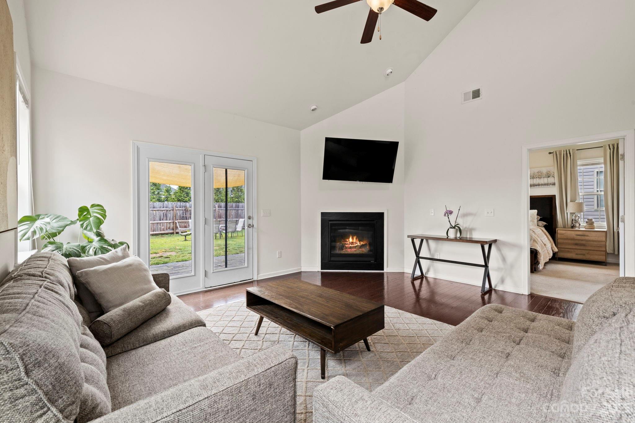 59 North River Road Fletcher, NC 28732 - Photo 8 of 36 a living room with furniture and a fireplace