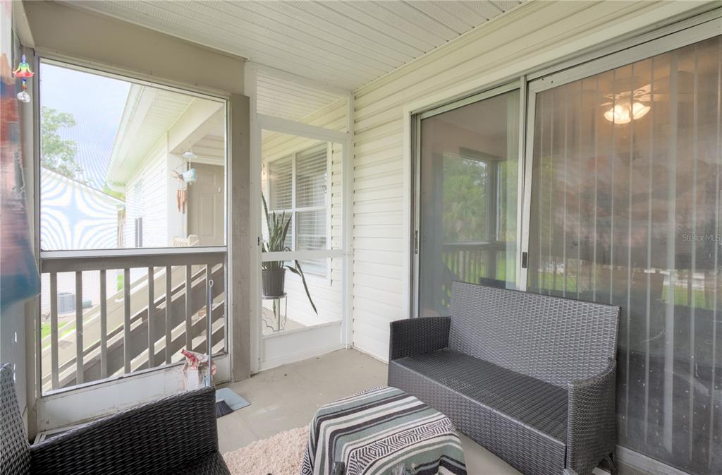 1600 Big Tree Road, Unit A7 South Daytona, FL 32119 - Photo 15 of 22 a living room with furniture and a window