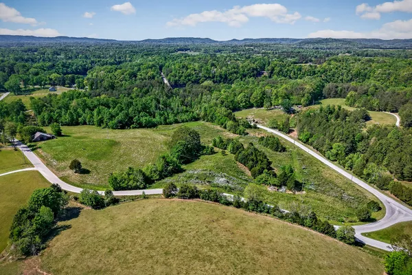 a view of a chairs and table in a room
