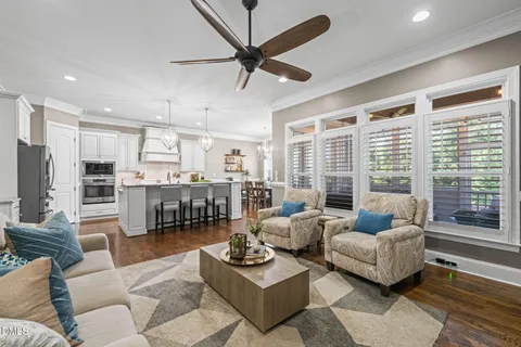a kitchen with a table and chairs in it