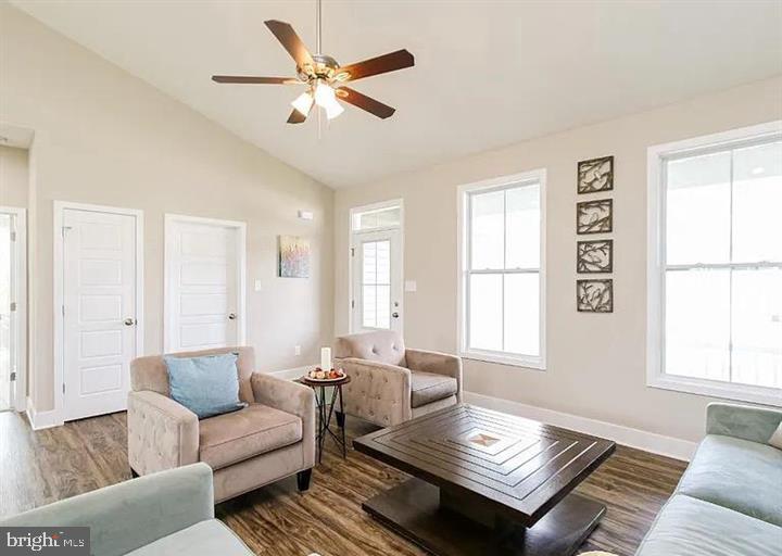 15 Glenaire Road Bunker Hill, WV 25413 - Photo 6 of 23 a living room with furniture and a window