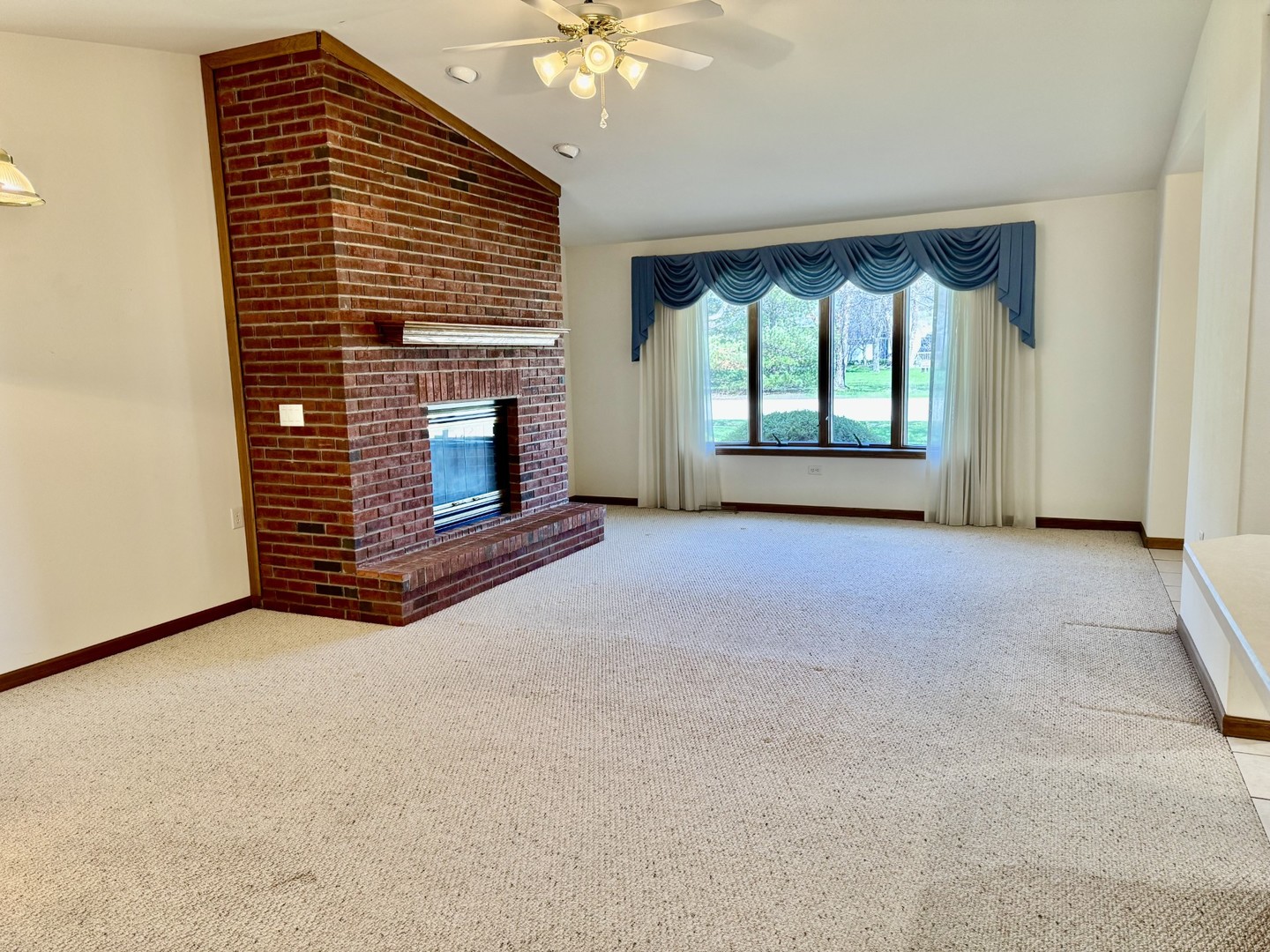 2800 Becker Drive Peru, IL 61354 - Photo 13 of 23 a view of livingroom with fireplace and window