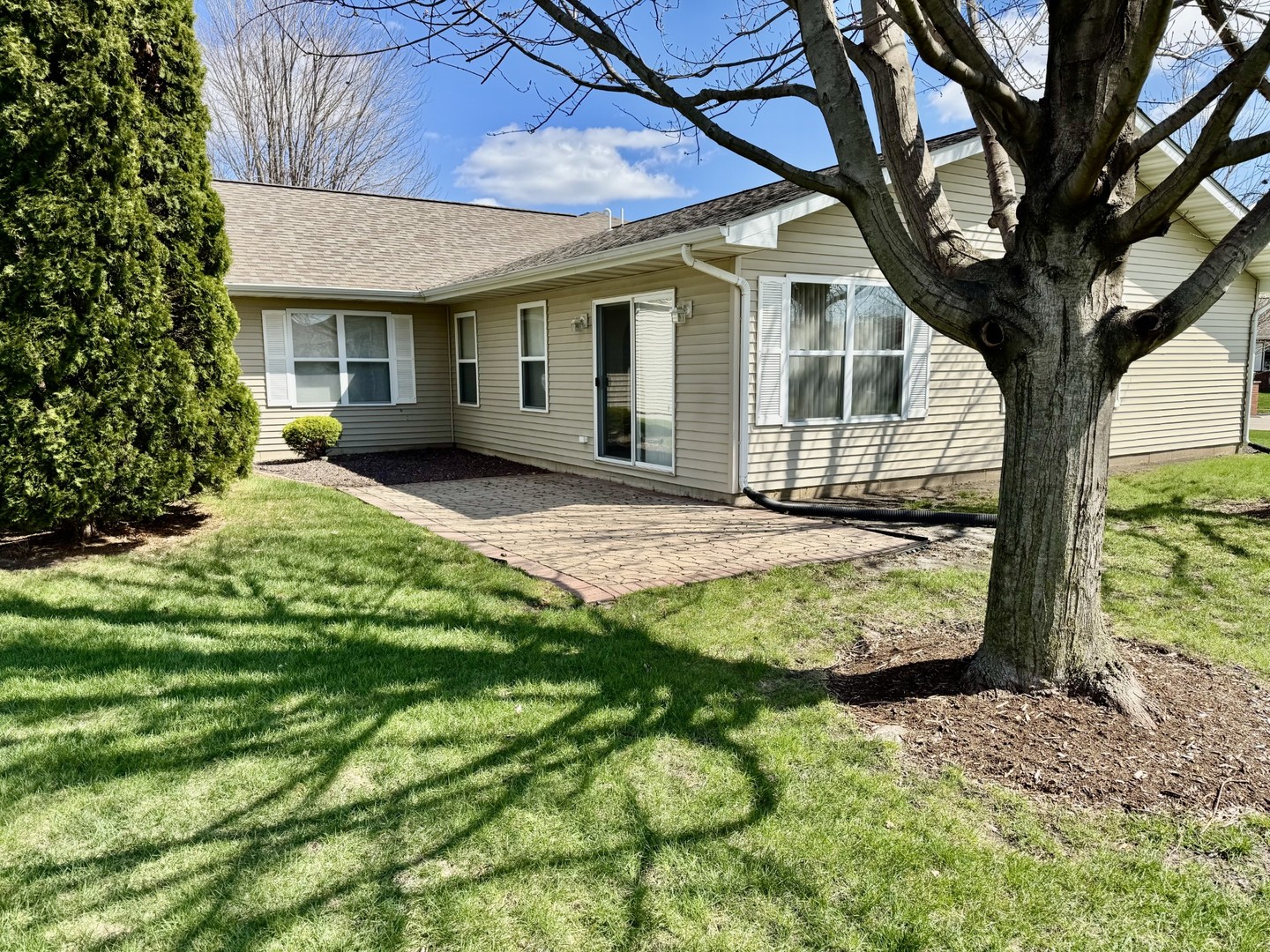 2800 Becker Drive Peru, IL 61354 - Photo 5 of 23 a view of a house with a tree in the yard next to a yard
