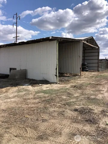 a view of garage with wooden floor