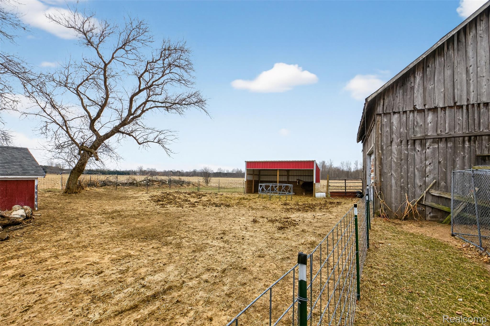 5639 Swaffer Road Millington, MI 48746 - Photo 20 of 25 View of yard featuring an outbuilding and a view of countryside
