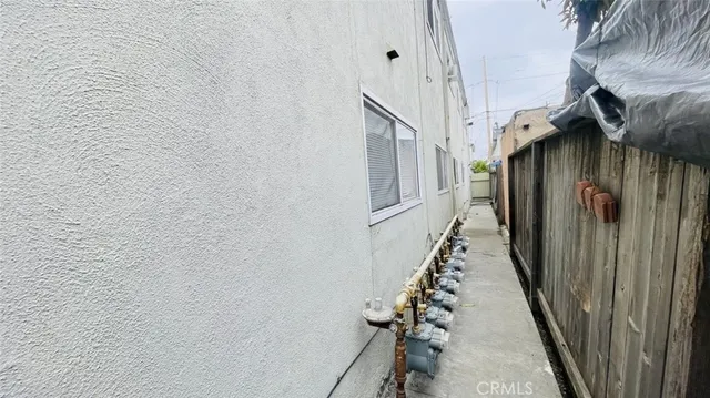 a kitchen that has a sink and a stove