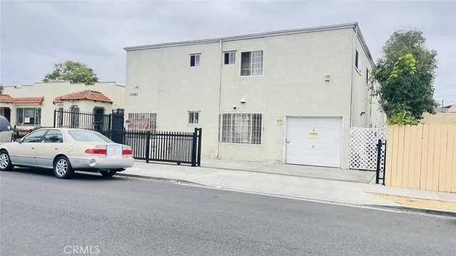 a view of room with wooden floor