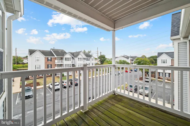a view of a balcony with city view