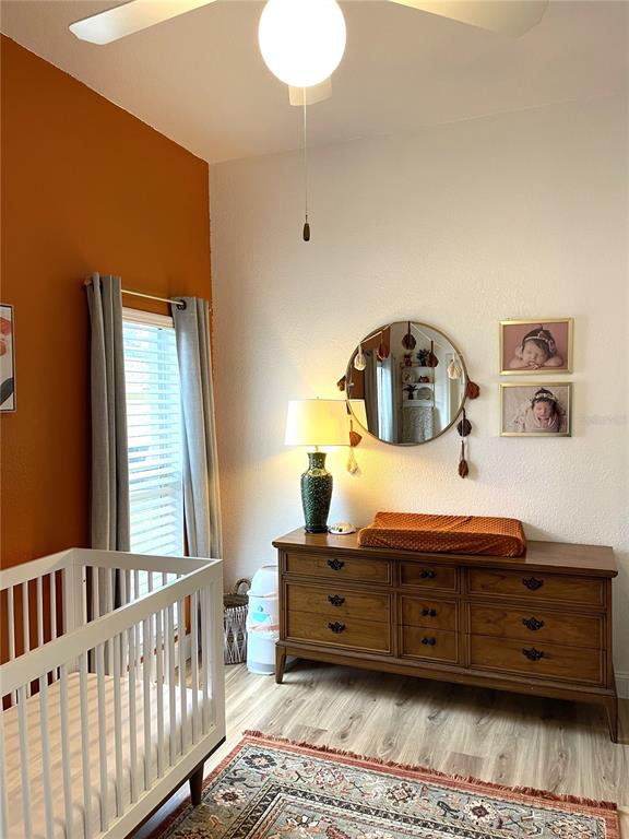 5941 Velvet Loop Lakeland, FL 33811 - Photo 17 of 61 a bed room with a bed and a window