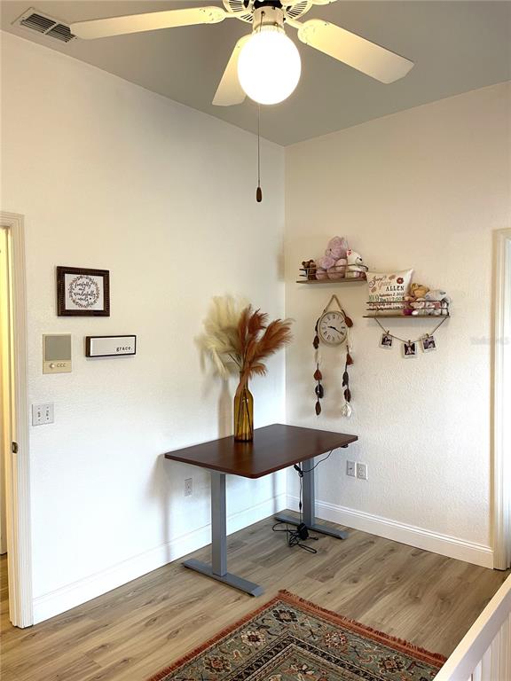 5941 Velvet Loop Lakeland, FL 33811 - Photo 18 of 61 a view of a room with a table and chairs